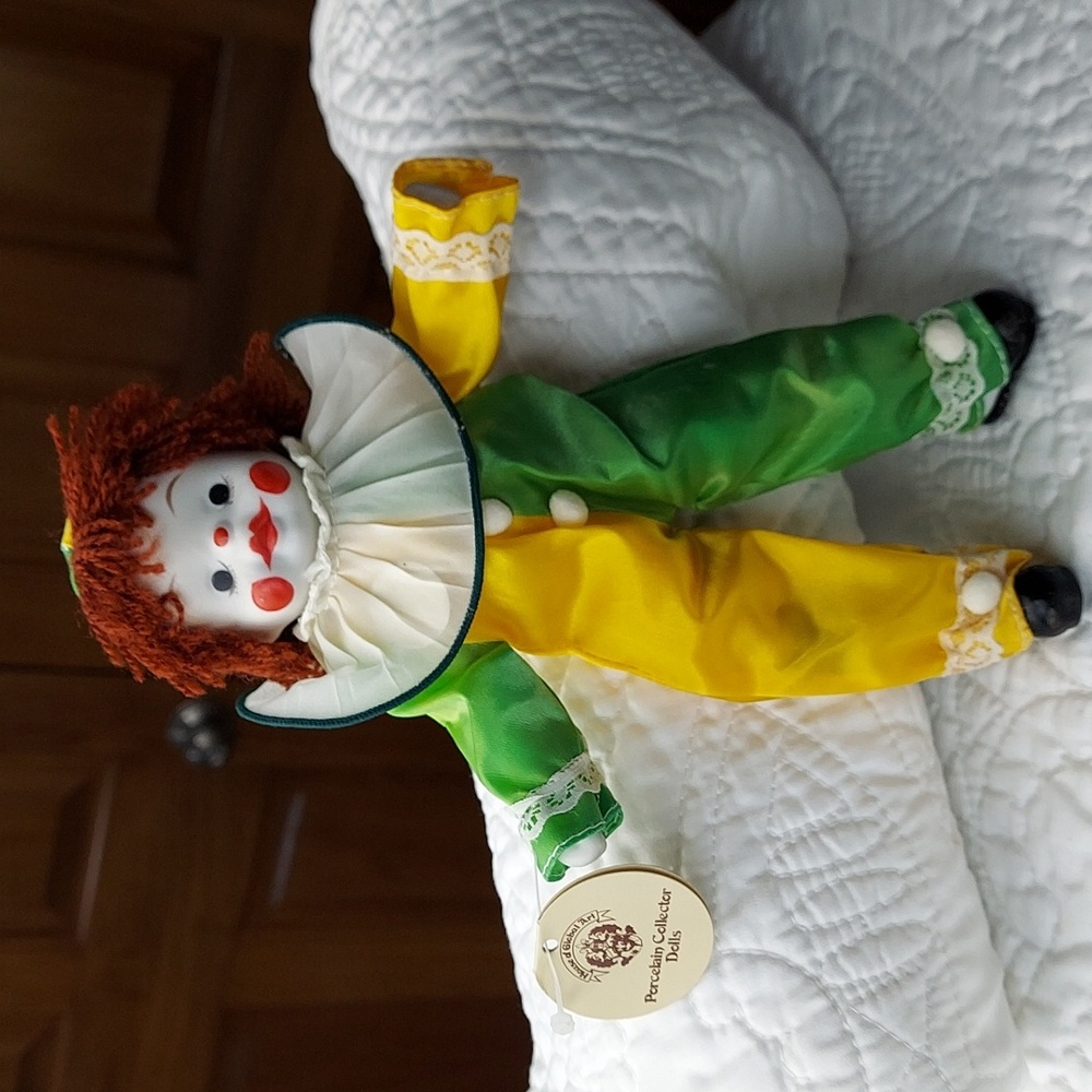 * House of Global Art Porcelain Posable Green and Yellow Clown Doll, Vintage